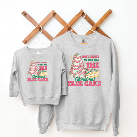 Kringle Krate Christmas Store “Most likely to eat all the Christmas Tree Cakes” Sweatshirt
