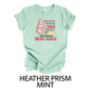 Kringle Krate Christmas Store “Most Likely to Eat All of the Christmas Tree Cakes” T-Shirt
