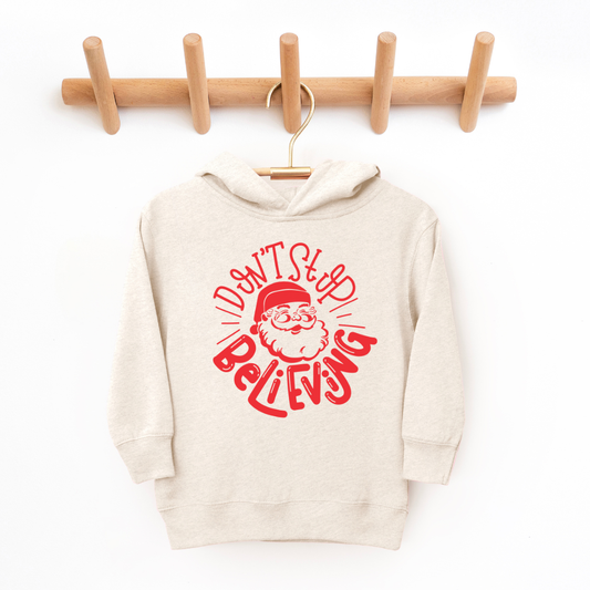 Kringle Krate Christmas Store "Don't Stop Believe'n" Youth Hooded Sweatshirt