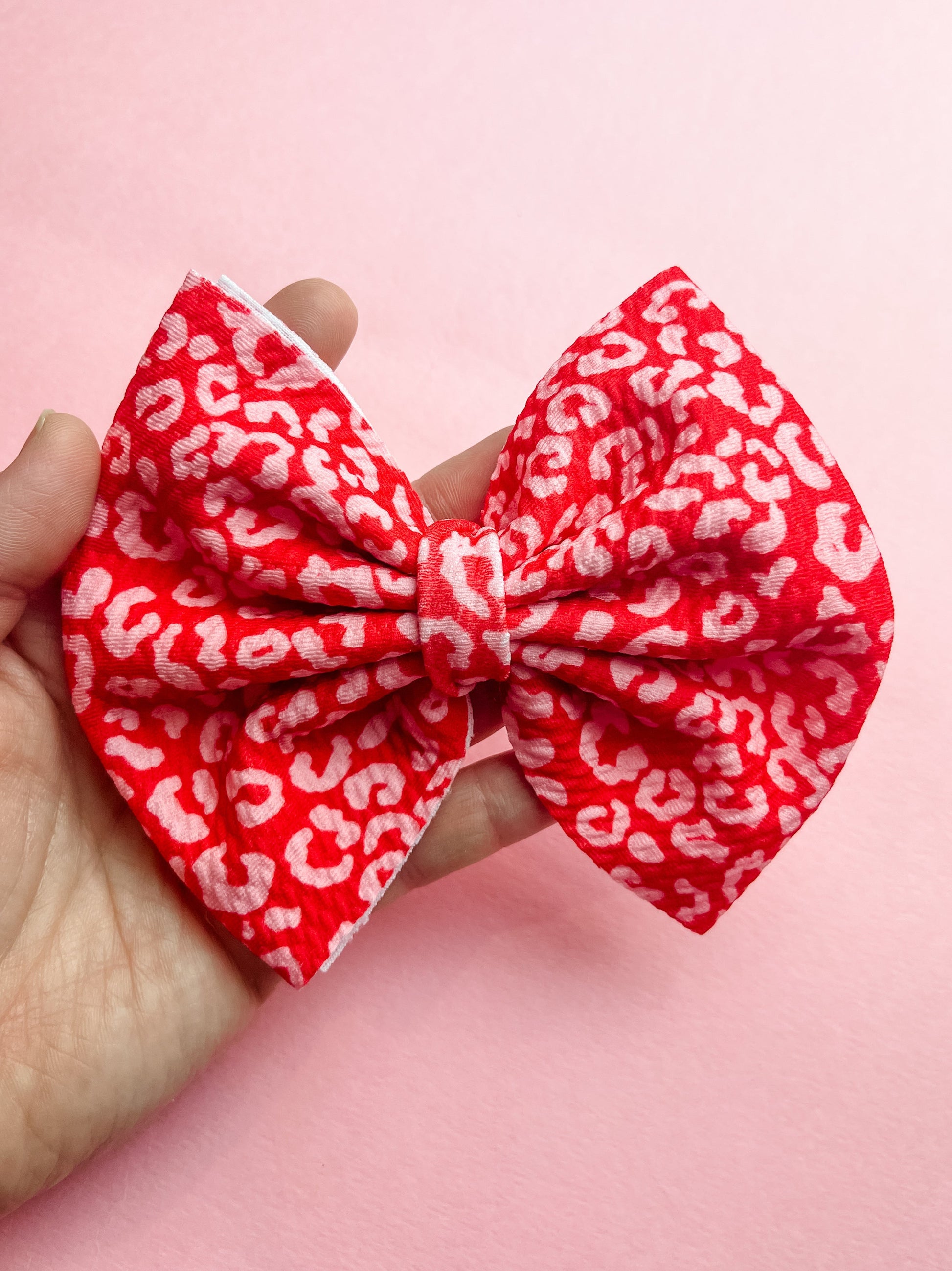 Kringle Krate Christmas Store Red Cheetah Bow