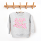 Kringle Krate Christmas Store Pink Santa Baby Chenille Patch Youth Crewneck Sweatshirt